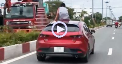 Phạt nữ tài xế Tiền Giang để bé trai ngồi trên mui ô tô đang lao vun vút