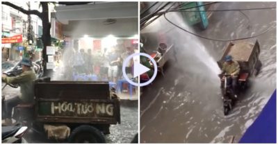 Video: Cả phố hú hồn với xe công nông bắn nước mưa như vòi rồng