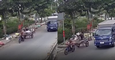 Camera ghi lại cảnh 2 nam thanh niên ném nhiều bao tải rác như ‘chuyền hàng’ xuống đường