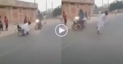 Video: Người đàn ông ngồi xe lăn bật chạy khi xe máy lao đến