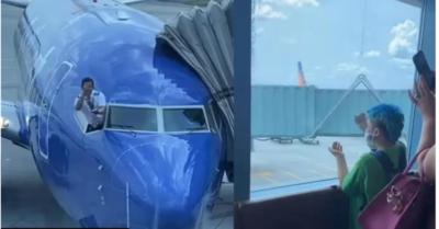 Video: Phi công chơi oẳn tù tì với trẻ em qua cửa sổ buồng lái máy bay