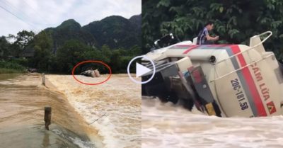 Video: Xe bồn lật giữa dòng nước lũ, tài xế trèo lên nóc phương tiện chờ giải cứu