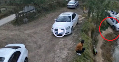 Video: Ôtô bất ngờ lao xuống hồ nước khi đang đỗ trên bờ khiến tài xế ngơ ngác
