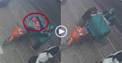 Video: Cha shipper cho con nằm gọn trong thùng hàng tránh gió rét mùa đông