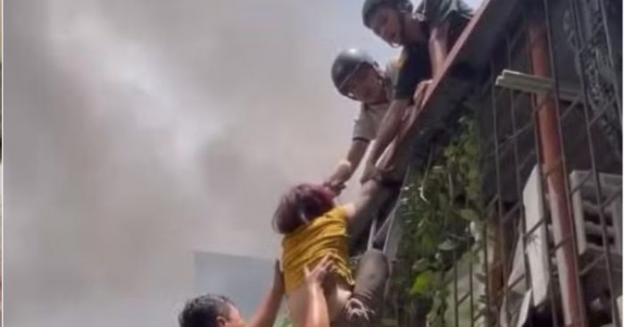 Hà Nội: Giải cứu 3 người mắc kẹt trong vụ cháy nhà cao tầng